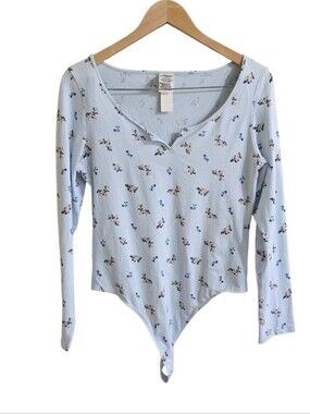 NWOT. Victoria's Secret PINK Pastel Blue Floral Long Sleeve Bodysuit. SZ Large
